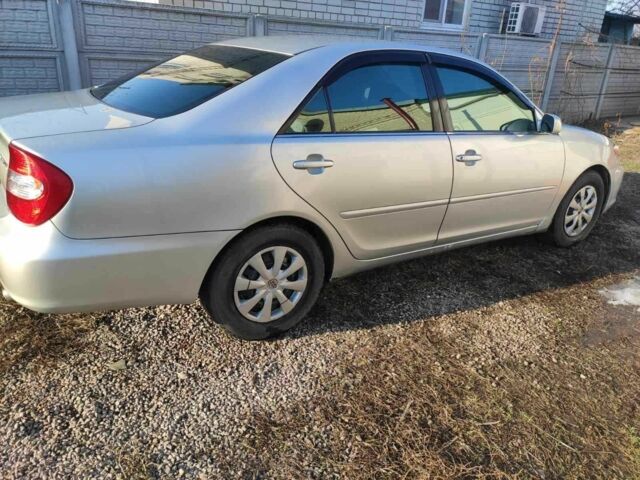 Сірий Тойота Камрі, об'ємом двигуна 2.4 л та пробігом 250 тис. км за 5000 $, фото 1 на Automoto.ua