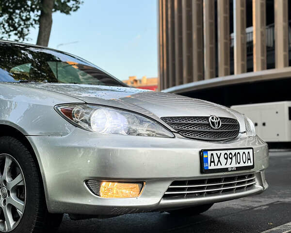 Серый Тойота Камри, объемом двигателя 3 л и пробегом 247 тыс. км за 5000 $, фото 1 на Automoto.ua