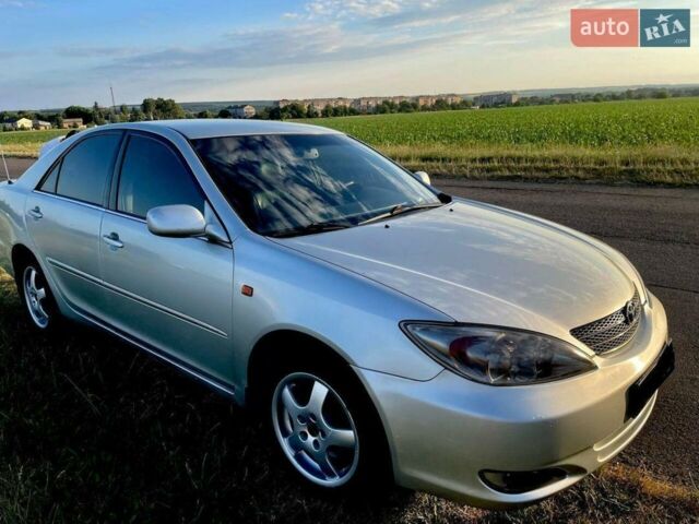 Сірий Тойота Камрі, об'ємом двигуна 2.4 л та пробігом 320 тис. км за 5300 $, фото 1 на Automoto.ua
