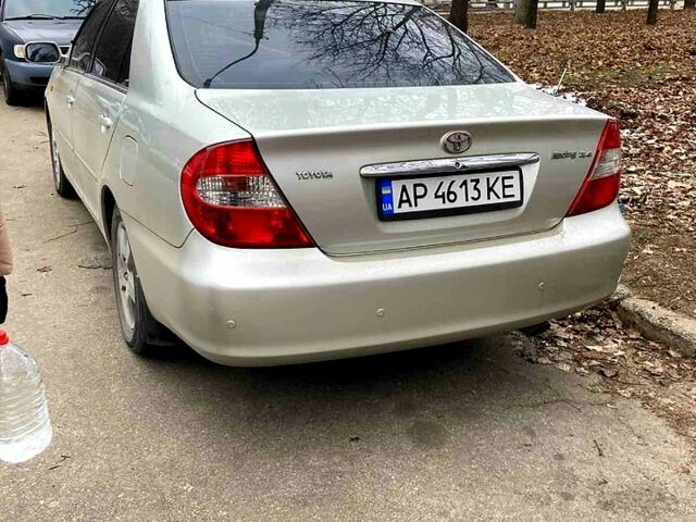 Серый Тойота Камри, объемом двигателя 2.4 л и пробегом 270 тыс. км за 5500 $, фото 1 на Automoto.ua