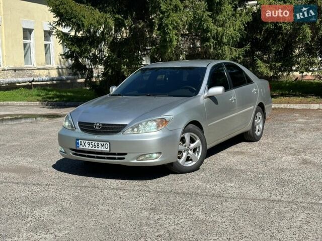 Серый Тойота Камри, объемом двигателя 2.36 л и пробегом 252 тыс. км за 6500 $, фото 1 на Automoto.ua