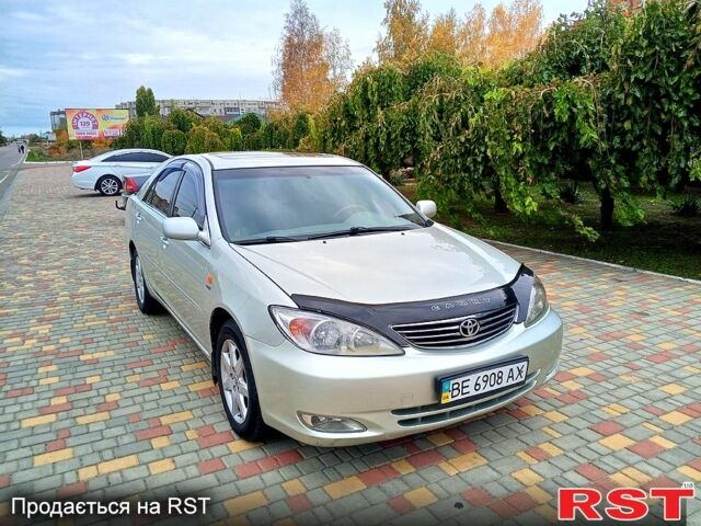 Серый Тойота Камри, объемом двигателя 2.4 л и пробегом 303 тыс. км за 5500 $, фото 1 на Automoto.ua