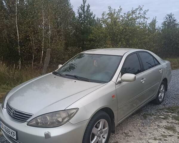 Серый Тойота Камри, объемом двигателя 2.36 л и пробегом 260 тыс. км за 6700 $, фото 1 на Automoto.ua