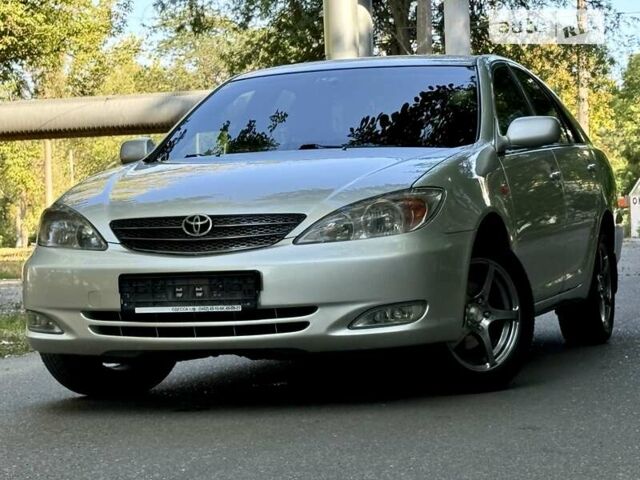 Серый Тойота Камри, объемом двигателя 2.36 л и пробегом 213 тыс. км за 6300 $, фото 1 на Automoto.ua