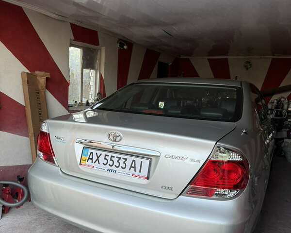 Серый Тойота Камри, объемом двигателя 2.4 л и пробегом 42 тыс. км за 10900 $, фото 1 на Automoto.ua