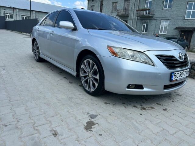 Серый Тойота Камри, объемом двигателя 2.4 л и пробегом 285 тыс. км за 7500 $, фото 1 на Automoto.ua