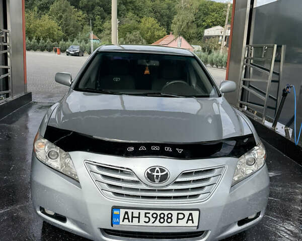 Серый Тойота Камри, объемом двигателя 2.36 л и пробегом 220 тыс. км за 8400 $, фото 1 на Automoto.ua