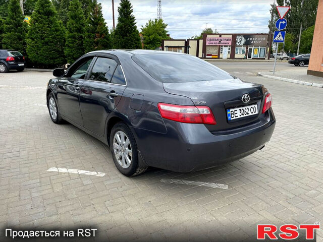 Серый Тойота Камри, объемом двигателя 2.4 л и пробегом 240 тыс. км за 7700 $, фото 1 на Automoto.ua