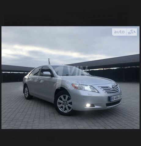 Серый Тойота Камри, объемом двигателя 2.4 л и пробегом 221 тыс. км за 8499 $, фото 1 на Automoto.ua