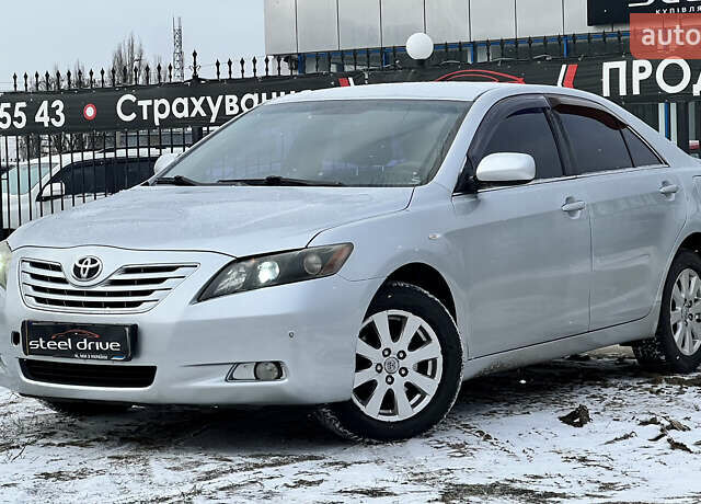 Серый Тойота Камри, объемом двигателя 2.4 л и пробегом 252 тыс. км за 6799 $, фото 1 на Automoto.ua