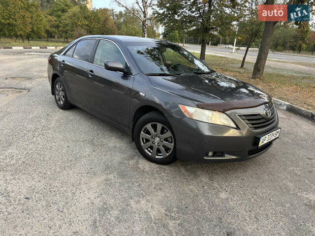 Серый Тойота Камри, объемом двигателя 2.4 л и пробегом 269 тыс. км за 8100 $, фото 1 на Automoto.ua
