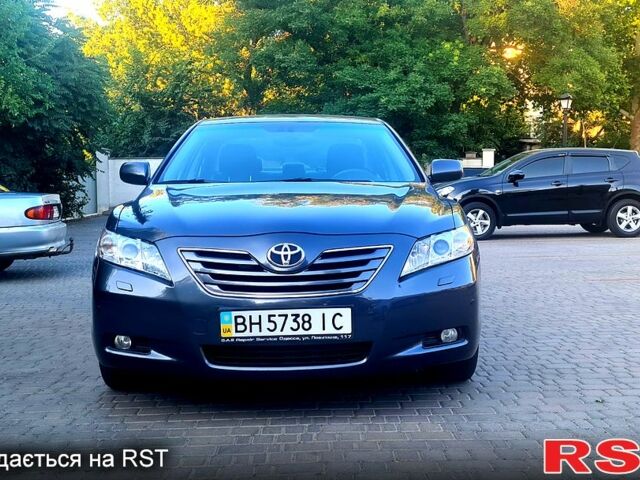 Серый Тойота Камри, объемом двигателя 2.4 л и пробегом 167 тыс. км за 9100 $, фото 1 на Automoto.ua