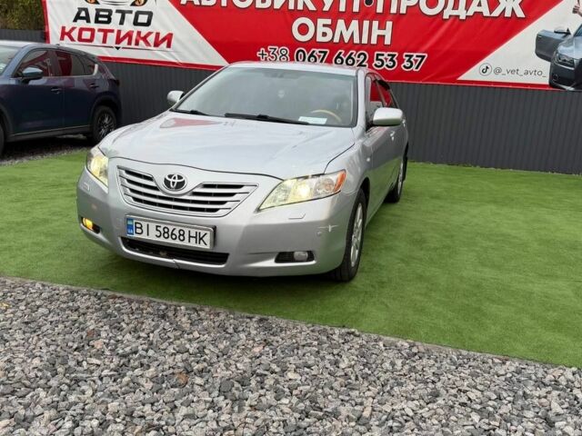 Сірий Тойота Камрі, об'ємом двигуна 3.5 л та пробігом 245 тис. км за 7007 $, фото 1 на Automoto.ua