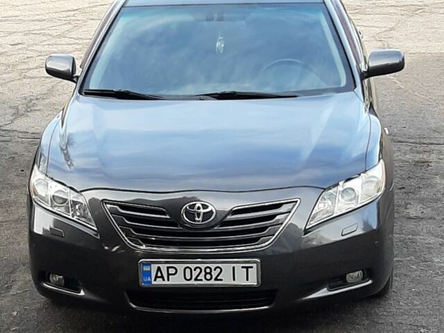 Серый Тойота Камри, объемом двигателя 2.4 л и пробегом 193 тыс. км за 9900 $, фото 1 на Automoto.ua