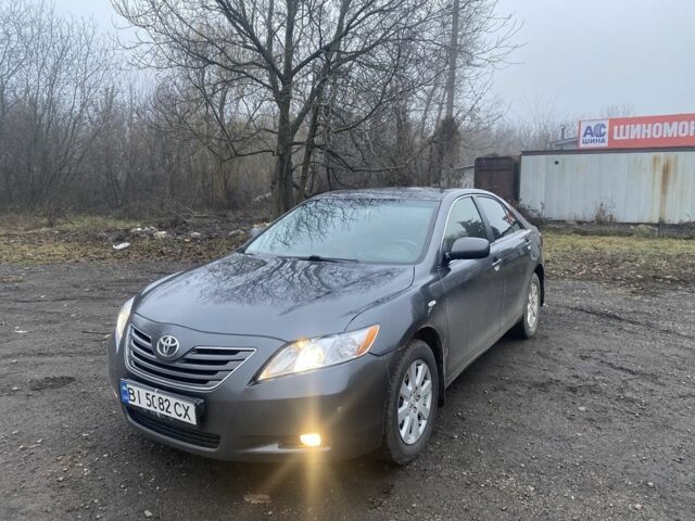 Серый Тойота Камри, объемом двигателя 2.4 л и пробегом 170 тыс. км за 7600 $, фото 1 на Automoto.ua