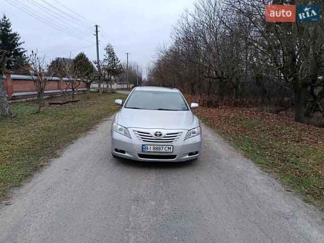 Серый Тойота Камри, объемом двигателя 2.36 л и пробегом 244 тыс. км за 7999 $, фото 1 на Automoto.ua