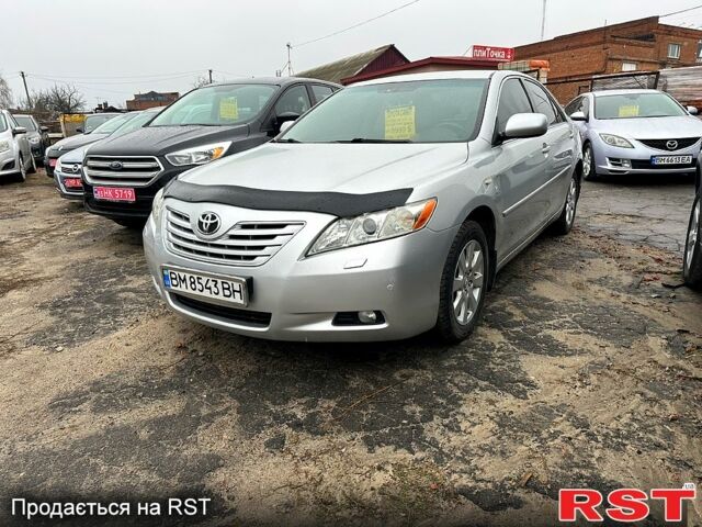 Серый Тойота Камри, объемом двигателя 2.4 л и пробегом 230 тыс. км за 8999 $, фото 1 на Automoto.ua