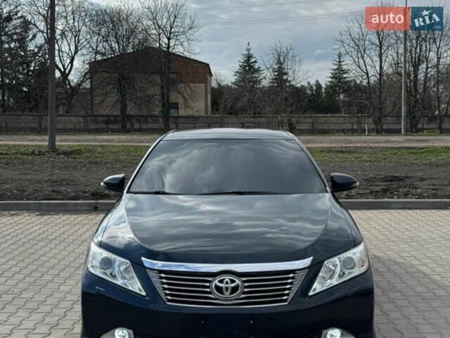 Серый Тойота Камри, объемом двигателя 2.5 л и пробегом 240 тыс. км за 11000 $, фото 1 на Automoto.ua