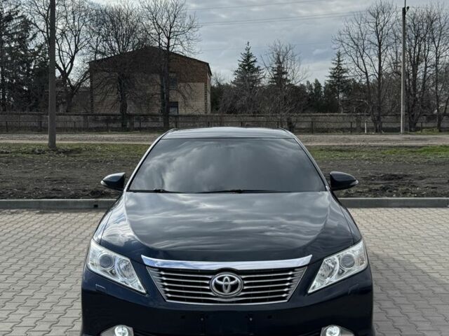 Серый Тойота Камри, объемом двигателя 2.5 л и пробегом 240 тыс. км за 11000 $, фото 1 на Automoto.ua