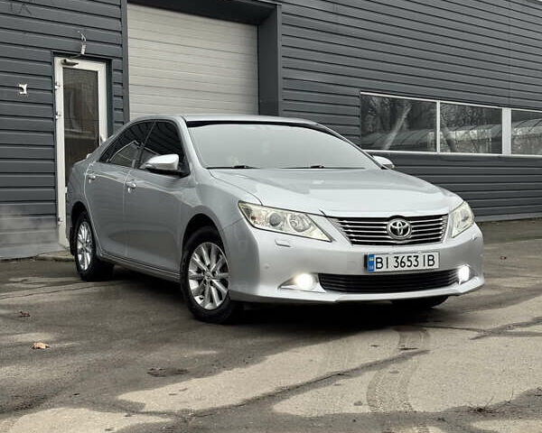 Серый Тойота Камри, объемом двигателя 2.49 л и пробегом 191 тыс. км за 13300 $, фото 1 на Automoto.ua