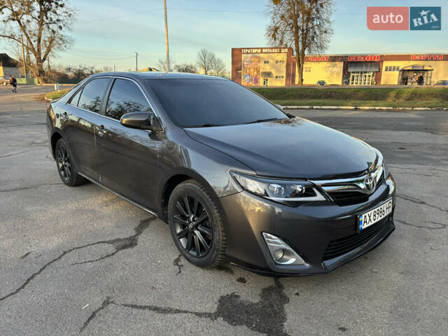 Сірий Тойота Камрі, об'ємом двигуна 2.49 л та пробігом 190 тис. км за 11800 $, фото 1 на Automoto.ua