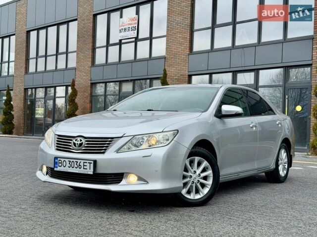Серый Тойота Камри, объемом двигателя 2.49 л и пробегом 238 тыс. км за 12999 $, фото 1 на Automoto.ua