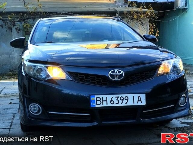 Серый Тойота Камри, объемом двигателя 2.5 л и пробегом 250 тыс. км за 13700 $, фото 1 на Automoto.ua