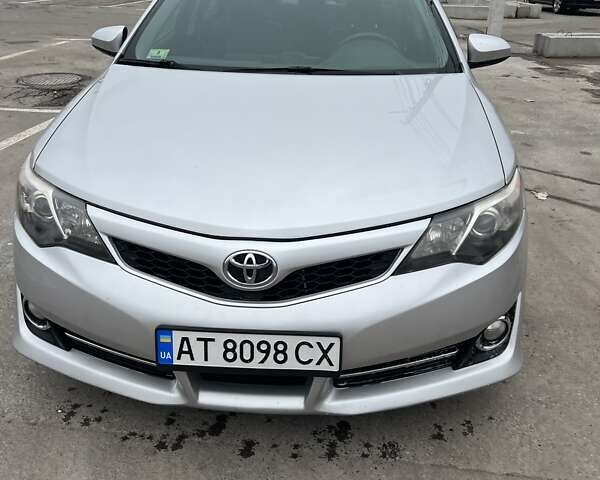 Серый Тойота Камри, объемом двигателя 2.5 л и пробегом 297 тыс. км за 10300 $, фото 1 на Automoto.ua