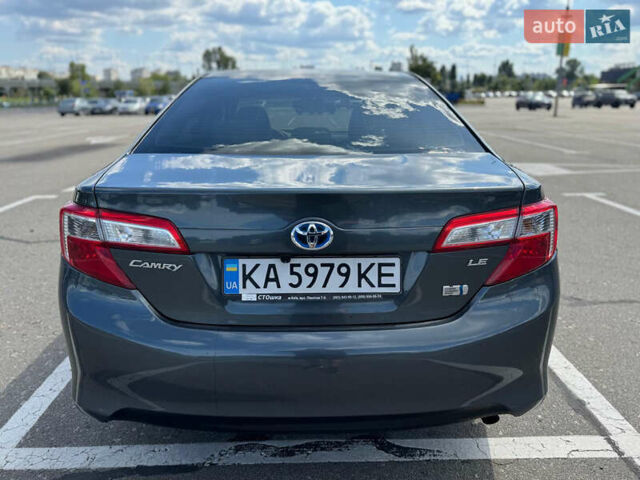 Серый Тойота Камри, объемом двигателя 2.49 л и пробегом 148 тыс. км за 10990 $, фото 1 на Automoto.ua