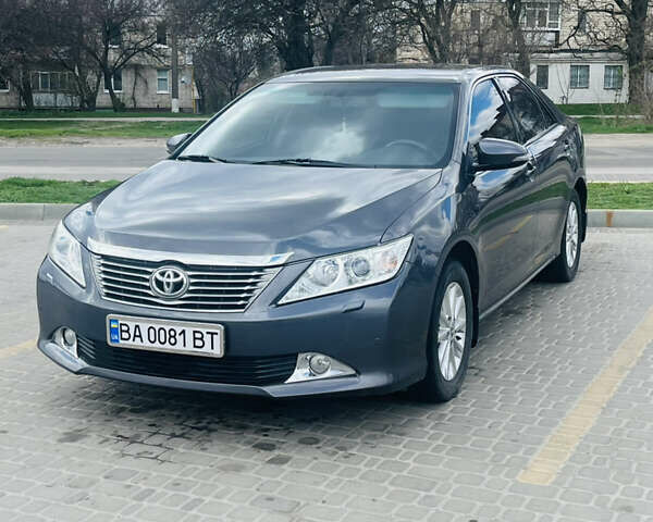 Сірий Тойота Камрі, об'ємом двигуна 2.49 л та пробігом 198 тис. км за 14700 $, фото 1 на Automoto.ua