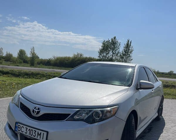 Серый Тойота Камри, объемом двигателя 2.5 л и пробегом 255 тыс. км за 11999 $, фото 1 на Automoto.ua