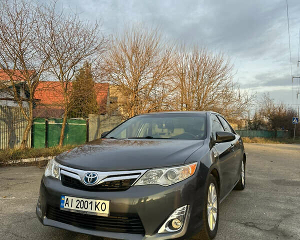 Серый Тойота Камри, объемом двигателя 2.49 л и пробегом 135 тыс. км за 14200 $, фото 1 на Automoto.ua