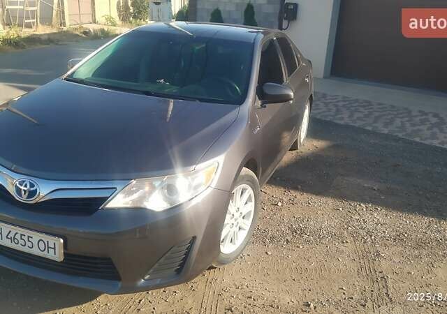 Серый Тойота Камри, объемом двигателя 2.49 л и пробегом 250 тыс. км за 12777 $, фото 1 на Automoto.ua