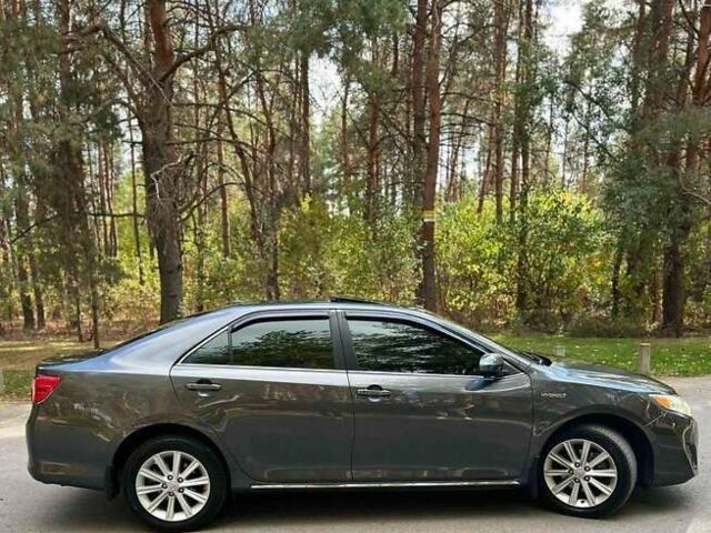 Серый Тойота Камри, объемом двигателя 2.49 л и пробегом 145 тыс. км за 12700 $, фото 1 на Automoto.ua