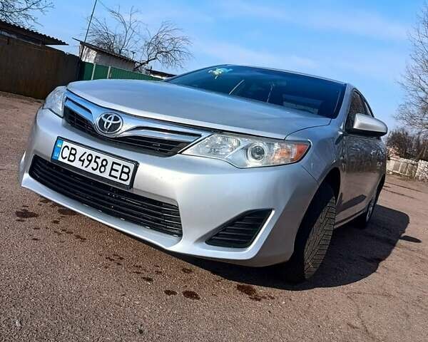 Серый Тойота Камри, объемом двигателя 2.5 л и пробегом 170 тыс. км за 10999 $, фото 1 на Automoto.ua