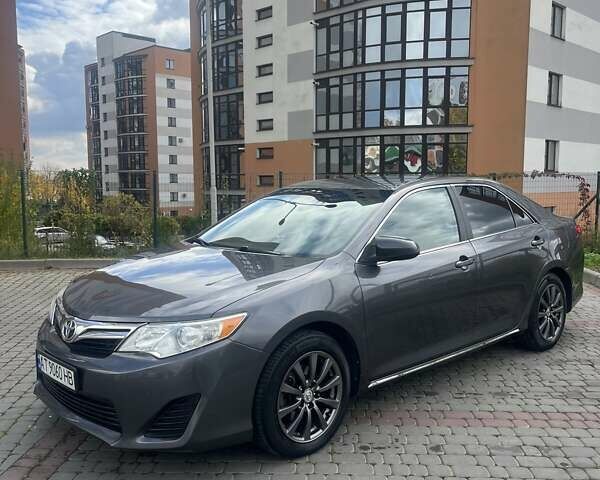 Сірий Тойота Камрі, об'ємом двигуна 2.49 л та пробігом 224 тис. км за 11900 $, фото 1 на Automoto.ua