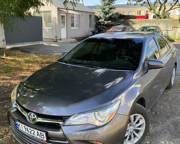 Серый Тойота Камри, объемом двигателя 2.49 л и пробегом 165 тыс. км за 12800 $, фото 1 на Automoto.ua