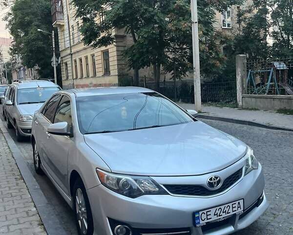 Серый Тойота Камри, объемом двигателя 2.5 л и пробегом 282 тыс. км за 12250 $, фото 1 на Automoto.ua