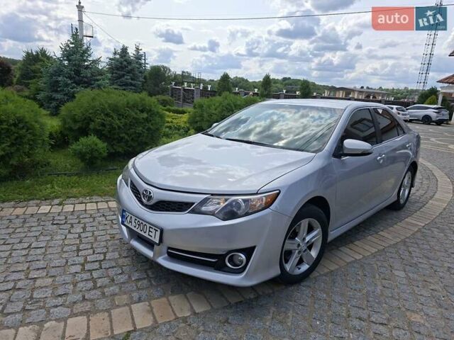 Серый Тойота Камри, объемом двигателя 2.5 л и пробегом 285 тыс. км за 11200 $, фото 1 на Automoto.ua