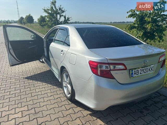 Серый Тойота Камри, объемом двигателя 2.49 л и пробегом 210 тыс. км за 12100 $, фото 1 на Automoto.ua