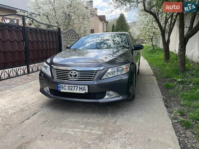 Сірий Тойота Камрі, об'ємом двигуна 2.49 л та пробігом 263 тис. км за 12900 $, фото 1 на Automoto.ua