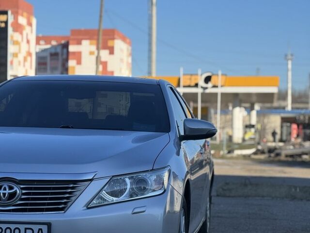 Серый Тойота Камри, объемом двигателя 2.5 л и пробегом 147 тыс. км за 14500 $, фото 1 на Automoto.ua