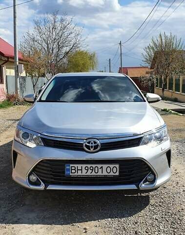 Серый Тойота Камри, объемом двигателя 2.5 л и пробегом 103 тыс. км за 16600 $, фото 1 на Automoto.ua