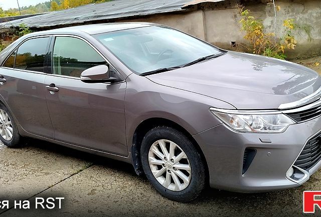 Серый Тойота Камри, объемом двигателя 2.5 л и пробегом 134 тыс. км за 10000 $, фото 1 на Automoto.ua