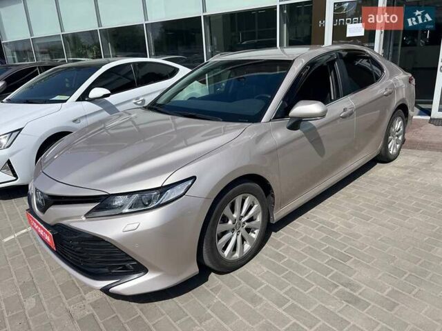 Сірий Тойота Камрі, об'ємом двигуна 2.49 л та пробігом 75 тис. км за 22700 $, фото 1 на Automoto.ua