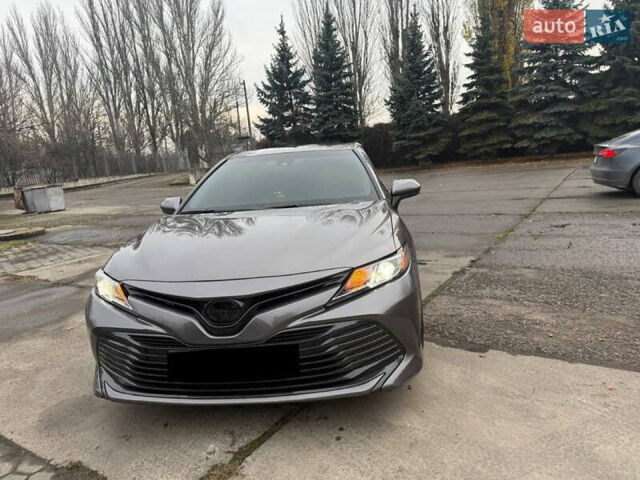 Серый Тойота Камри, объемом двигателя 2.49 л и пробегом 134 тыс. км за 17300 $, фото 1 на Automoto.ua