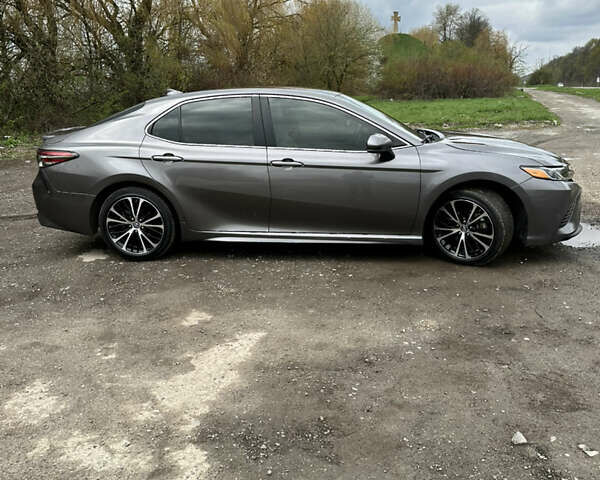 Сірий Тойота Камрі, об'ємом двигуна 2.49 л та пробігом 57 тис. км за 23500 $, фото 1 на Automoto.ua