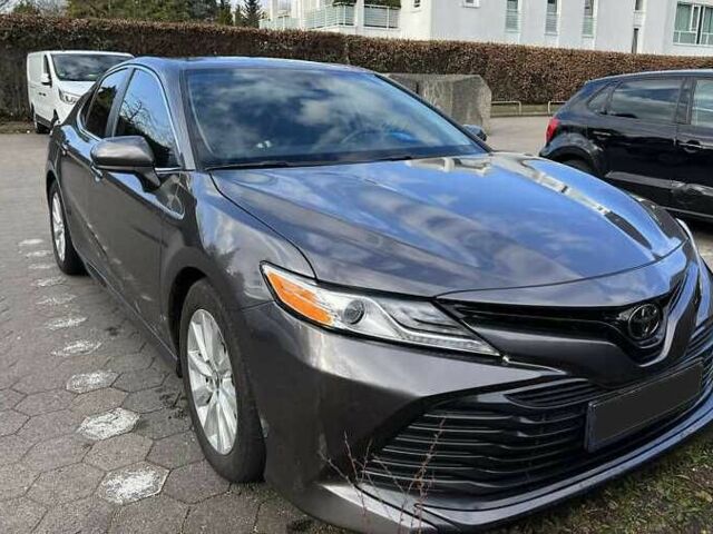 Серый Тойота Камри, объемом двигателя 2.5 л и пробегом 100 тыс. км за 17700 $, фото 1 на Automoto.ua