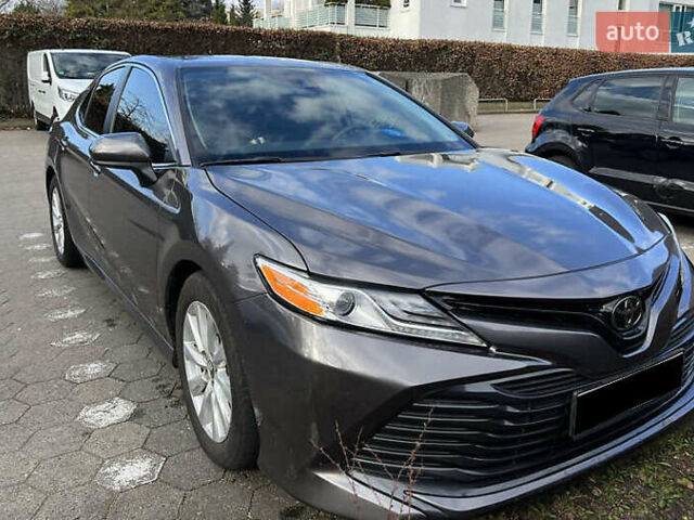 Сірий Тойота Камрі, об'ємом двигуна 2.49 л та пробігом 100 тис. км за 19700 $, фото 1 на Automoto.ua