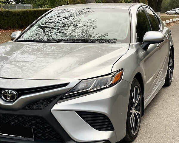 Серый Тойота Камри, объемом двигателя 2.49 л и пробегом 100 тыс. км за 20000 $, фото 1 на Automoto.ua